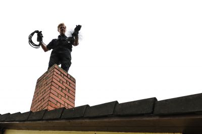 Professional assessing chimney